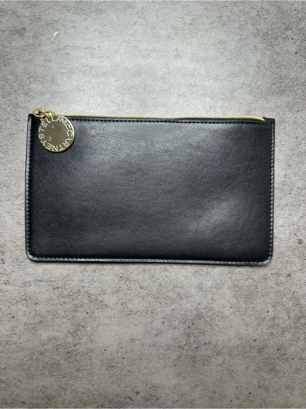 Stella McCartney Black Zip Pouch with Gold Medallion Charm